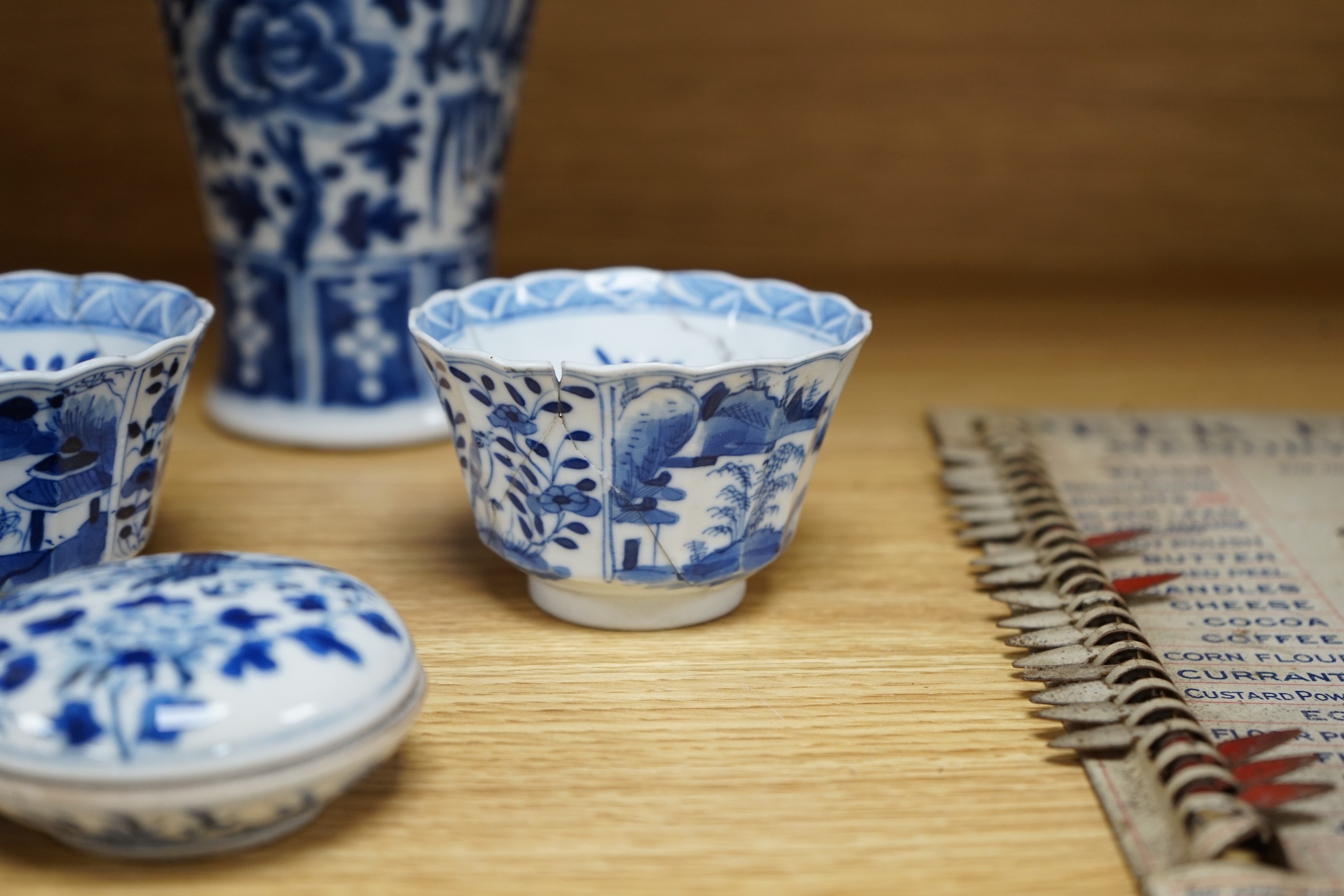 A Chinese blue and white phoenix decorated vase, a pair of circular boxes and a pair of damaged tea bowls. Late 19th century Tallest 17.5cm